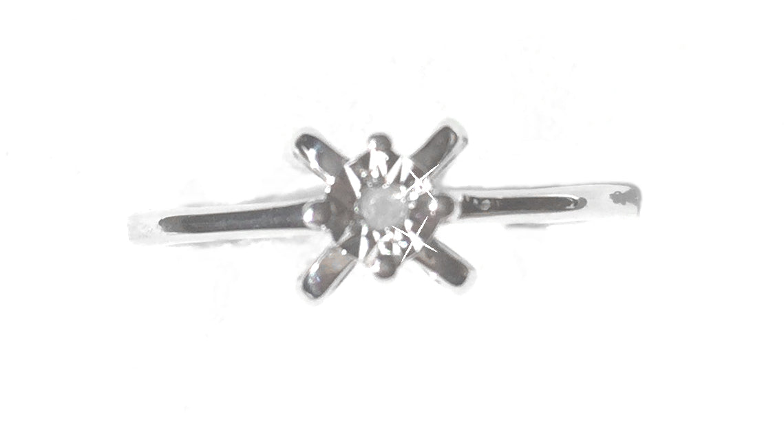 Diamond Halo Sterling Silver Ring, A unique and elegantly designed ring created with 0.020 carats of authentic diamond in a round cut, set in a criss-cross shaped surround that sits upon a solid sterling silver ring