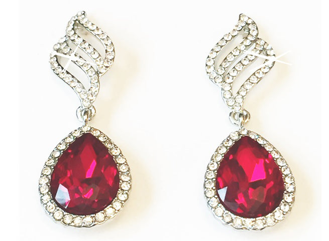 Opulent Red Earrings, These glamourous drop earrings are the epitome of opulence, the rich red waterdrop crystals are set in a multitude of crystal surround, cascading down from a unique clear crystal design